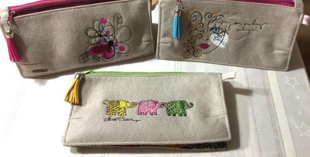 Free sewing pattern - the Gemini double wallet. I use mine for carrying my scissors and basic sewing supplies to class, but this double wallet is ideal for so much more! Love the embroidery options - very smart.