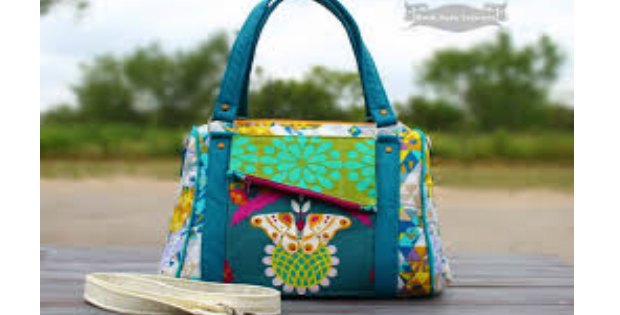 Sewing pattern for this 'Rockstar' bag. Looks fab in every possible combination of fabrics. The perfect purse sewing pattern. Check out the slide show for lots of examples to inspire you to sew this bag.