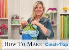 Video tutorial for how to sew a cinch top tote bucket with handles. Free sewing pattern.