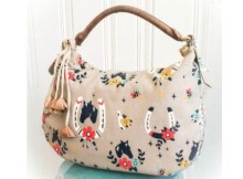Free purse sewing pattern. The Lauren purse is simple to make using just a yard of fabric. Free handbag sewing pattern.