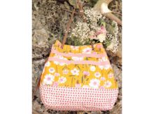 Here's a FREE pattern with a tutorial where you get to chose 3 different pieces of quilting cotton to make your Perennial Purse. Add on faux leather handles and you'll have yourself a beautiful purse.
