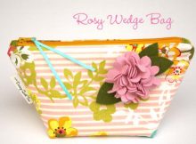 Sew Modern Bags are pleased to bring you yet another FREE pattern, this time it's the Rosy Wedge Bag. The Rosy Wedge Bag is a fully lined, wedge-shaped bag with a gusseted bottom that stands on its own and is designed to hold a lot of small cosmetics.