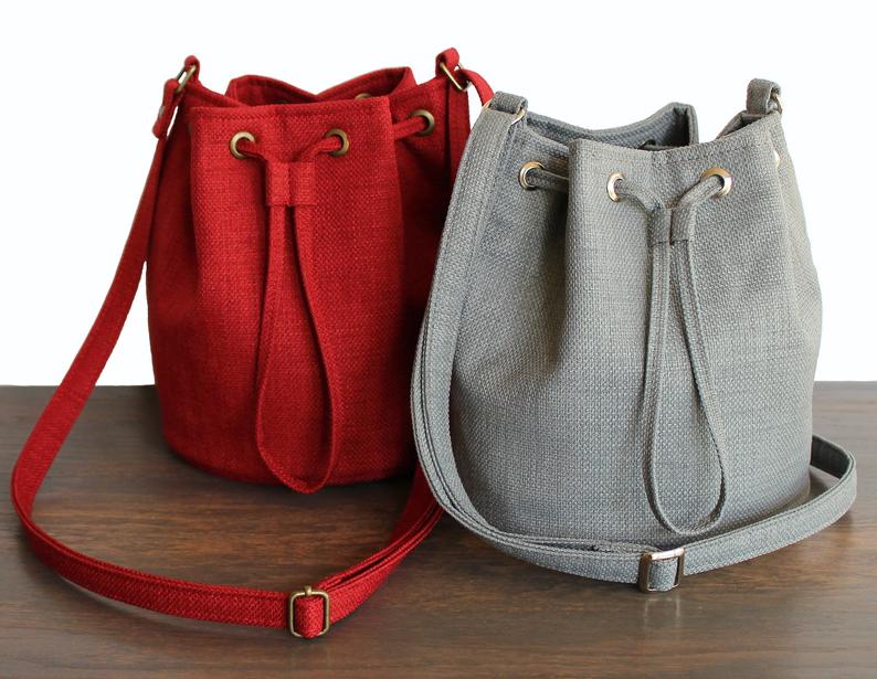 Minimalist Bucket Bag With Pom Pom Bag Charm & Inner Pouch