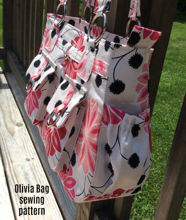 Digital sewing pattern. This is the Olivia Bag and it is not only roomy and functional but it has loads of pockets as well, which means that having one of these bags will give you plenty of opportunities to be super organized. The Olivia Bag makes a great purse or handbag but can also be a hobo bag or even a fantastic diaper bag with all those pockets.