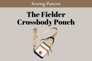 The Fielder Crossbody Pouch sewing pattern by Kandou Patterns — structured crossbody with front zipper pockets and adjustable strap